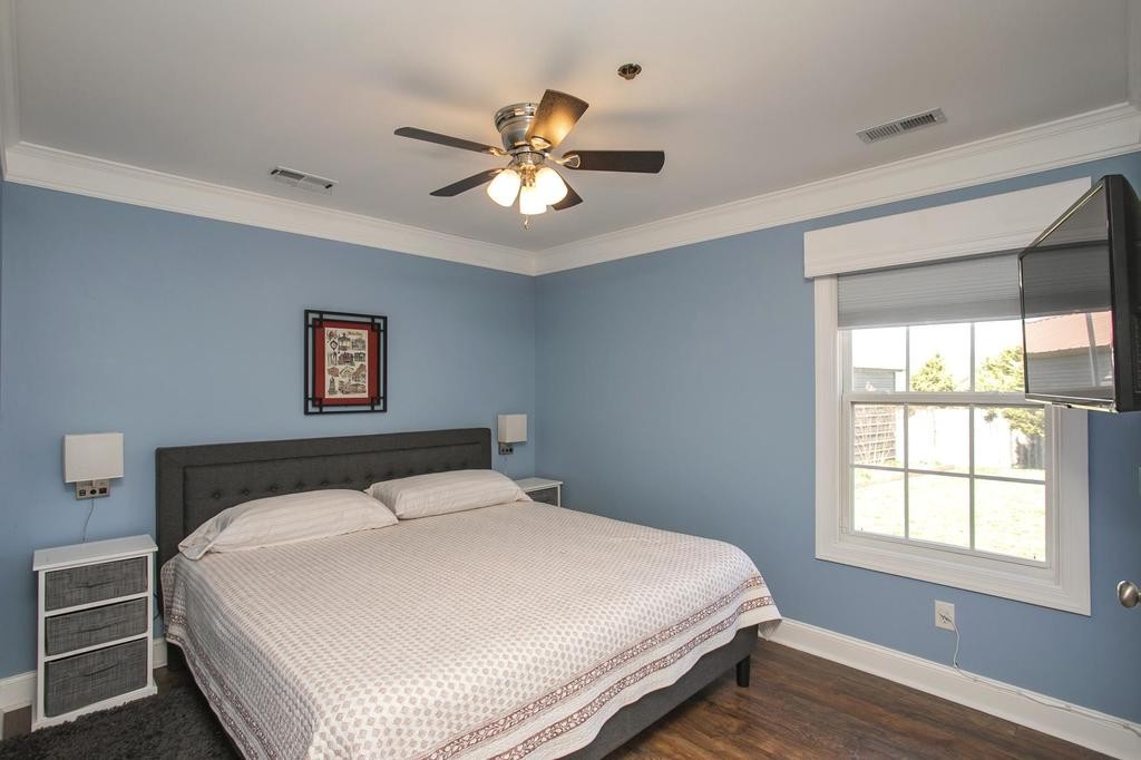 110 Edgewater Falls Murfreesboro, TN 37129 - Photo 18 of 31 a bedroom with a bed and a chandelier