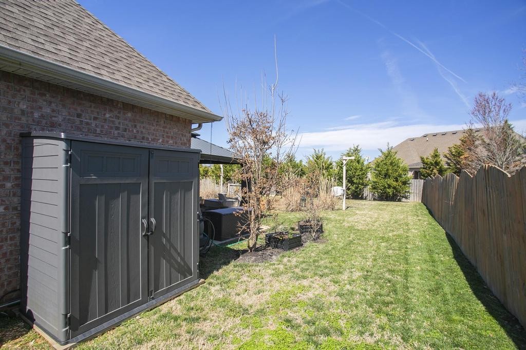 110 Edgewater Falls Murfreesboro, TN 37129 - Photo 22 of 31 a view of a backyard with garden