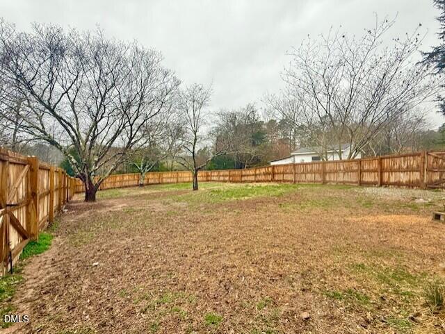8419 South Lowell Road Bahama, NC 27503 - Photo 22 of 26 fenced yard