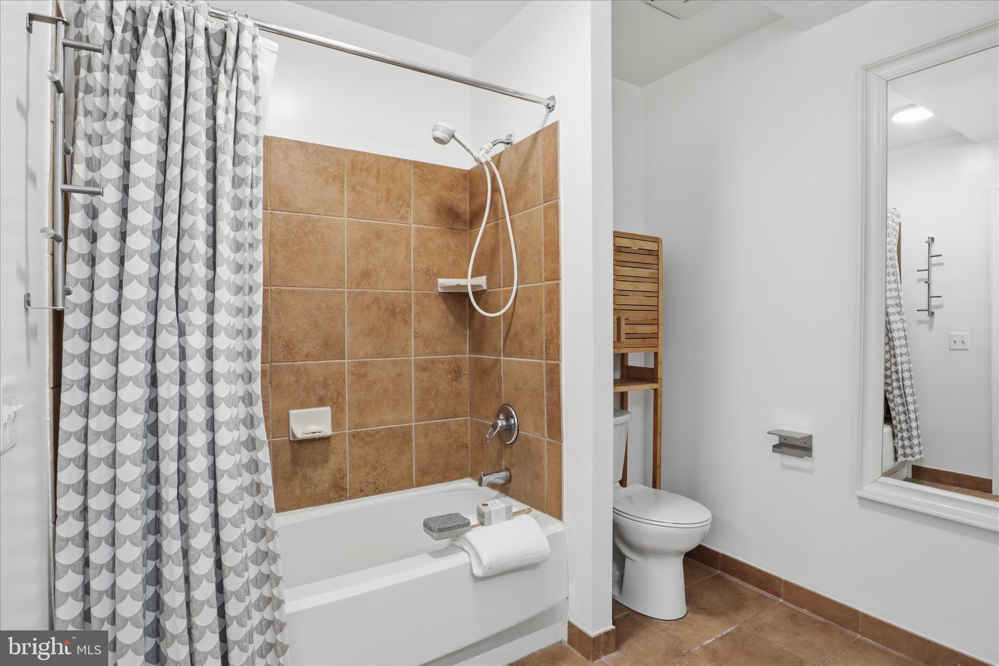 631 D Street Northwest, Unit 128 Washington, DC 20004 - Photo 13 of 87 a bathroom with a toilet and shower