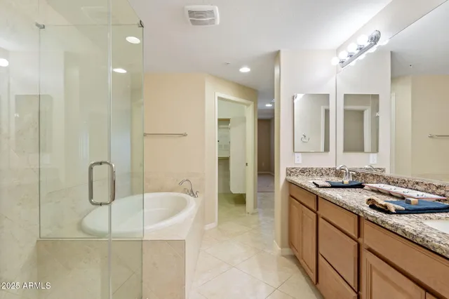 swimming pool view with a seating space