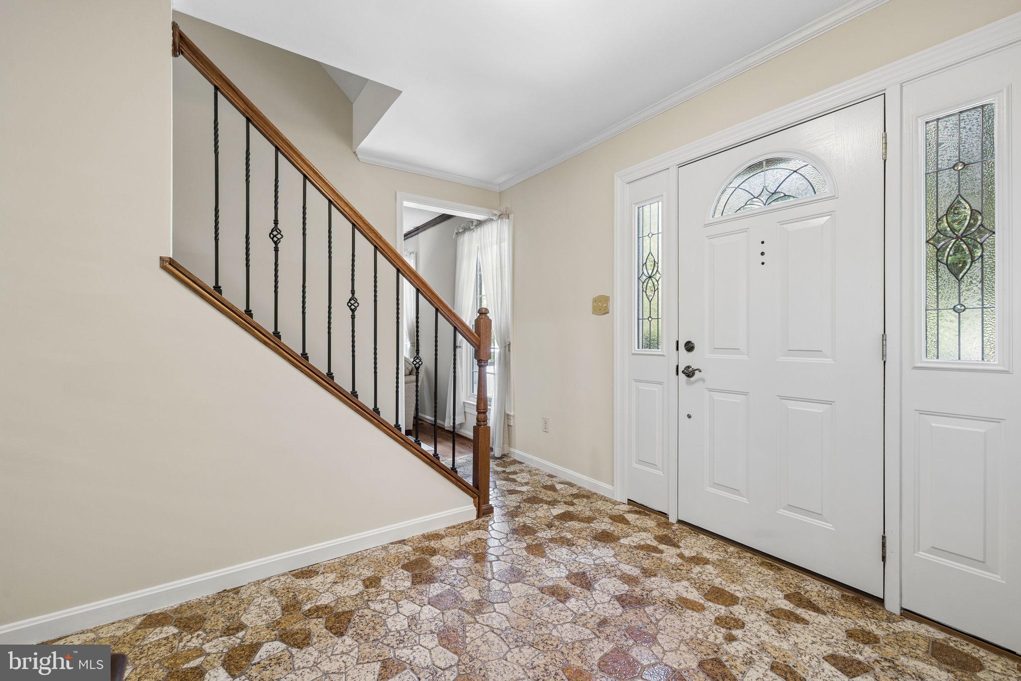8099 Counselor Road Manassas, VA 20112 - Photo 7 of 82 Custom stone floor foyer