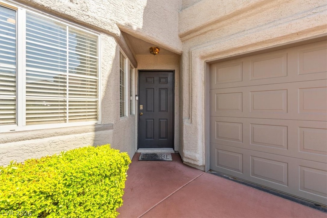 2377 Ramsgate Drive Henderson, NV 89074 - Photo 24 of 25 A welcoming entry invites you home, flanked by a convenient garage.