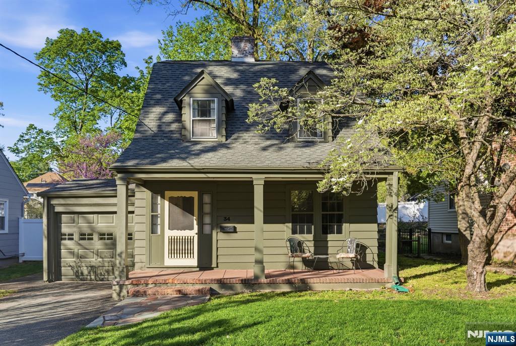 34 Espy Road Caldwell, NJ 07006 - Photo 1 of 25 front view of a house with a yard