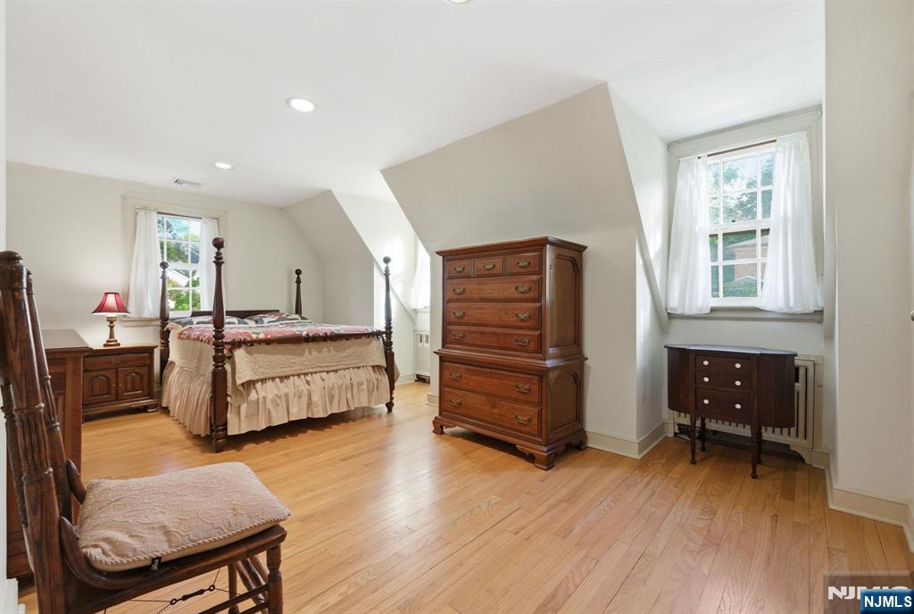 34 Espy Road Caldwell, NJ 07006 - Photo 16 of 25 a bedroom with furniture and a dresser