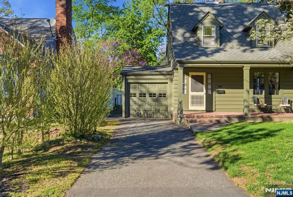 34 Espy Road Caldwell, NJ 07006 - Photo 20 of 25 front view of a house with a yard