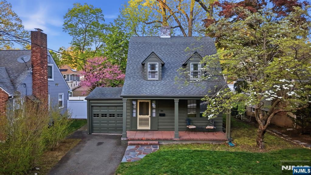 34 Espy Road Caldwell, NJ 07006 - Photo 21 of 25 front view of a house with a yard
