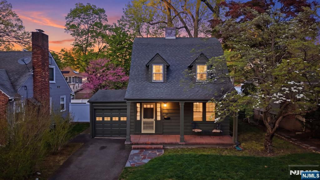 34 Espy Road Caldwell, NJ 07006 - Photo 23 of 25 front view of a house with a yard