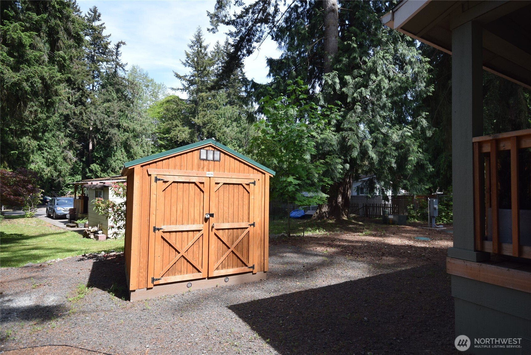 375 Dungeness Meadows Sequim, WA 98382 - Photo 24 of 27 a backyard of a house with basket ball court