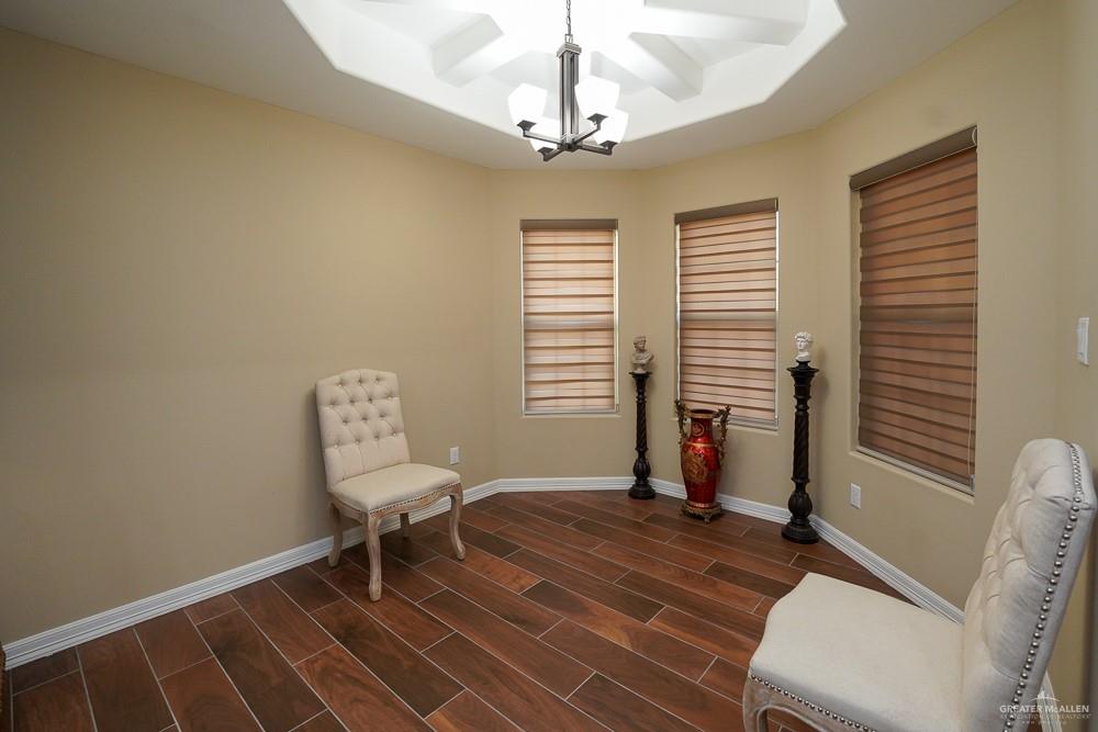 1408 Royola Street Mission, TX 78572 - Photo 16 of 42 a living room with furniture and a window