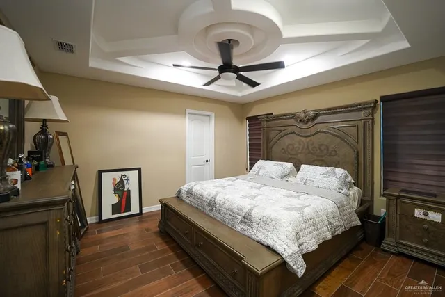 a bedroom with a bed and a walk in closet