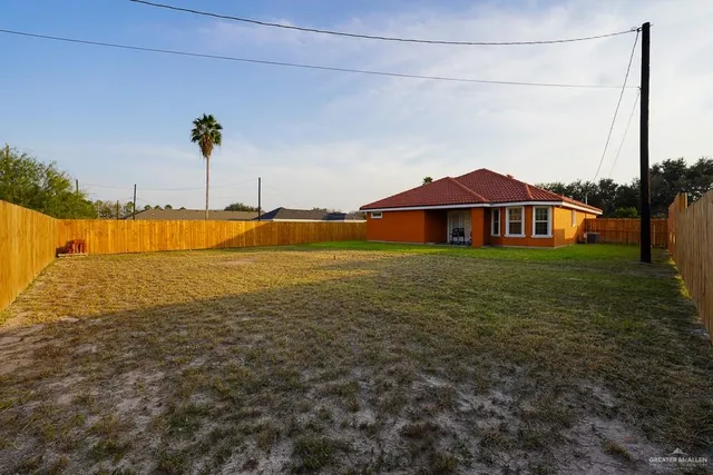 a view of a house with a big yard