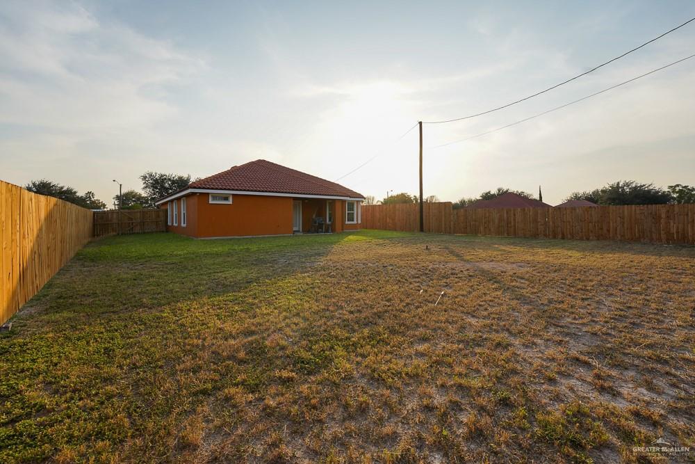 1408 Royola Street Mission, TX 78572 - Photo 34 of 42 a view of a large garden with plants and large trees