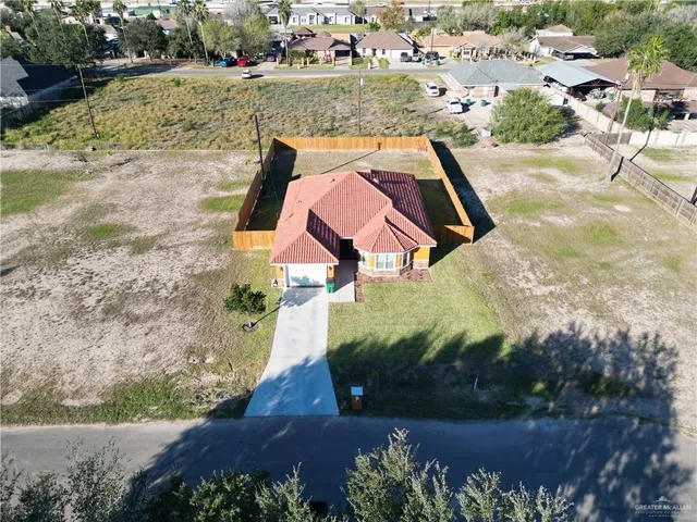 a view of a pool with a yard