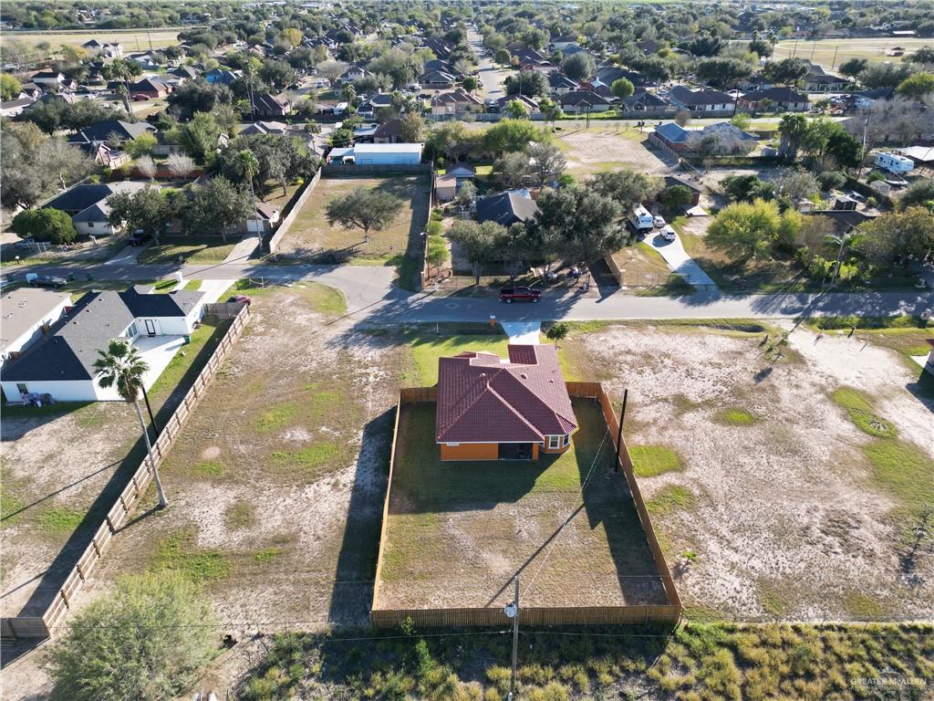 1408 Royola Street Mission, TX 78572 - Photo 41 of 42 an aerial view of residential houses with outdoor space