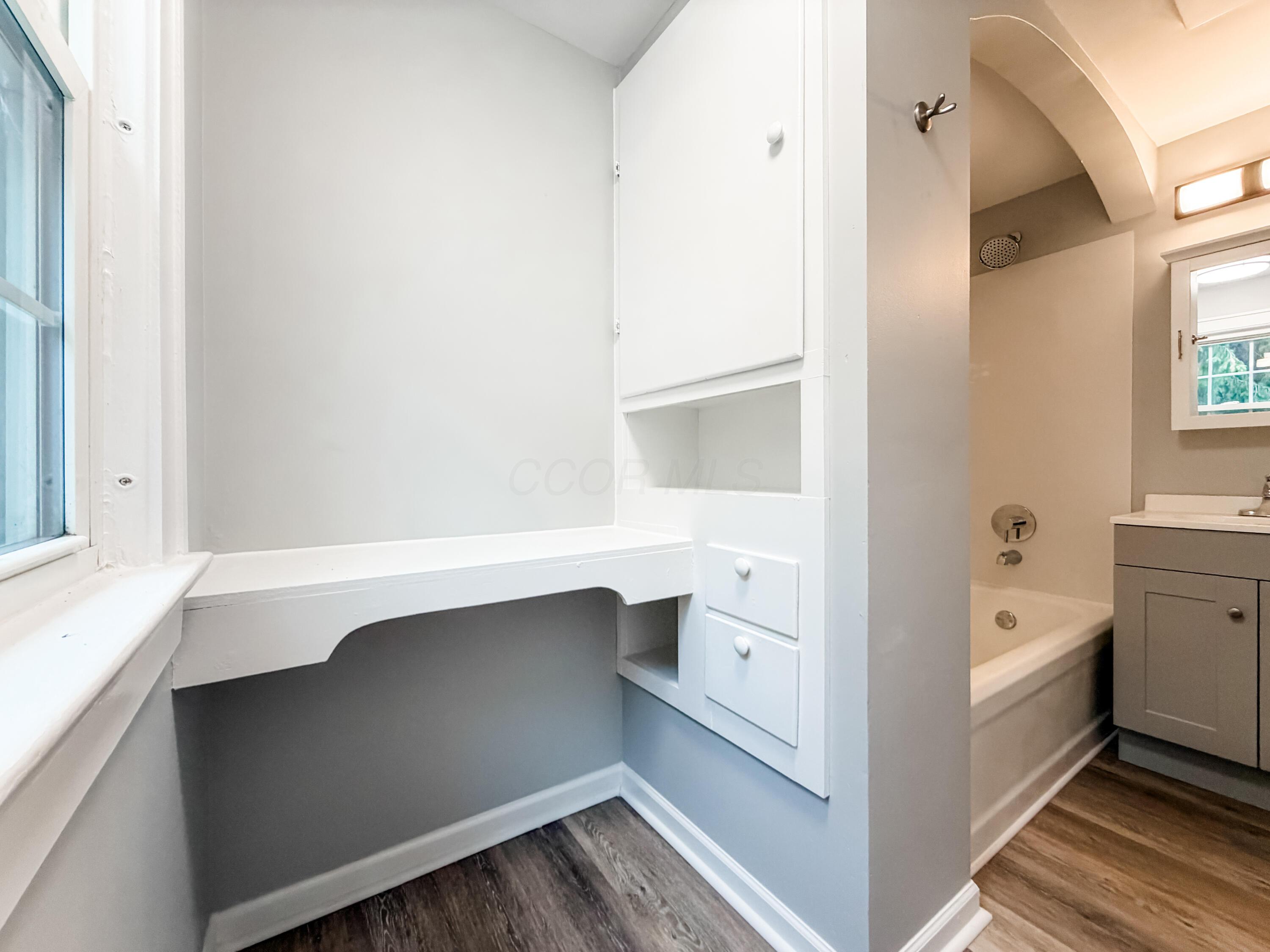 1693 Baltimore Road Northwest Lancaster, OH 43130 - Photo 23 of 38 Upstairs Bathroom View 3 with built in cabinetry an a vanity area.