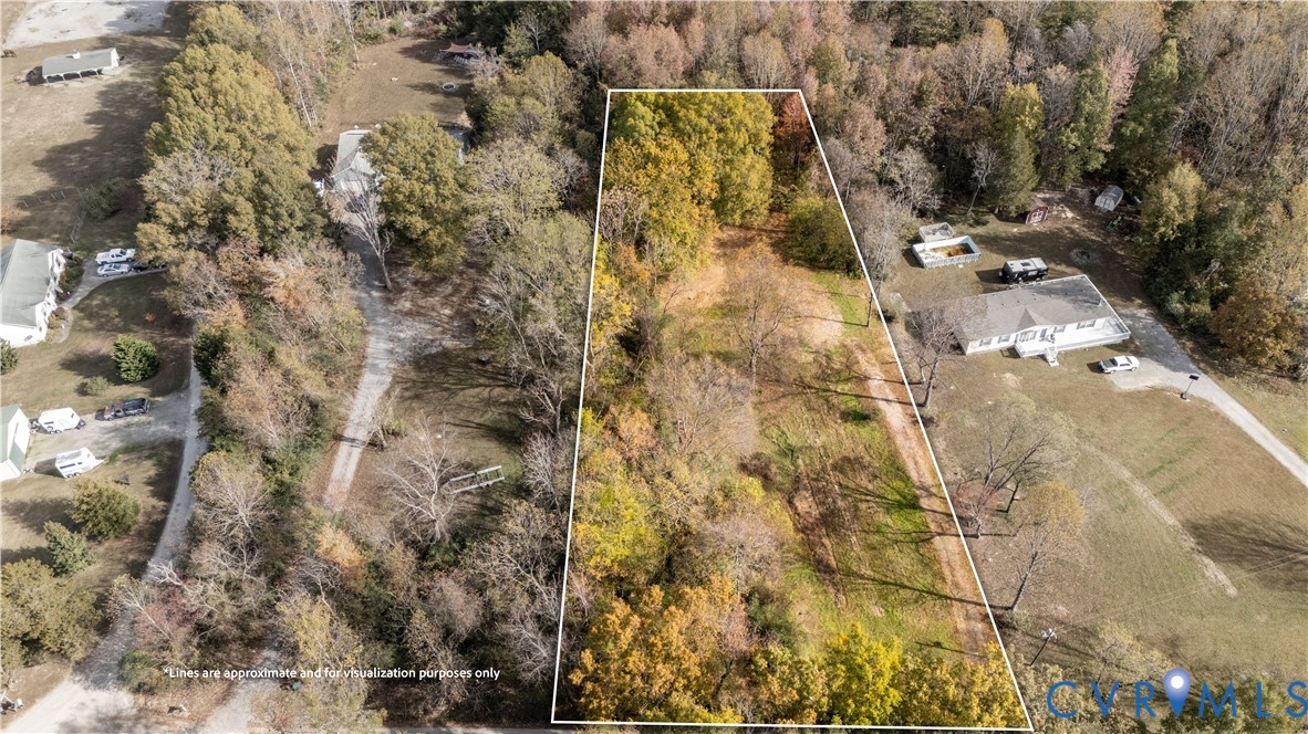 11919 Belfonte Road Bumpass, VA 23024 - Photo 5 of 10 a view of residential house with parking