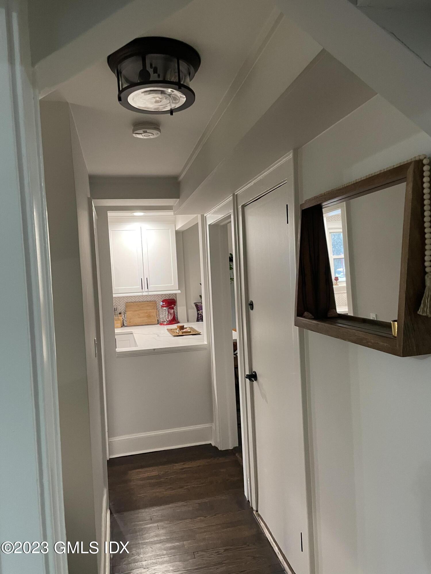 60 Weaver Street, Unit 2 Greenwich, CT 06831 - Photo 15 of 20 a view of hallway with wooden floor