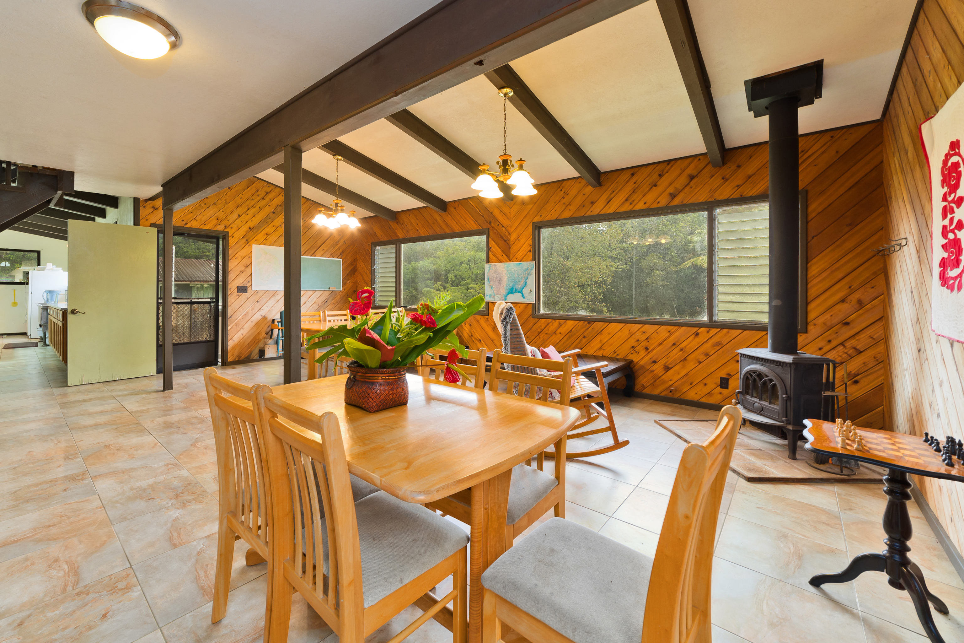 44-3342 Kula Kahiko Road Paauilo, HI 96776 - Photo 4 of 30 a dining room with furniture and a floor to ceiling window