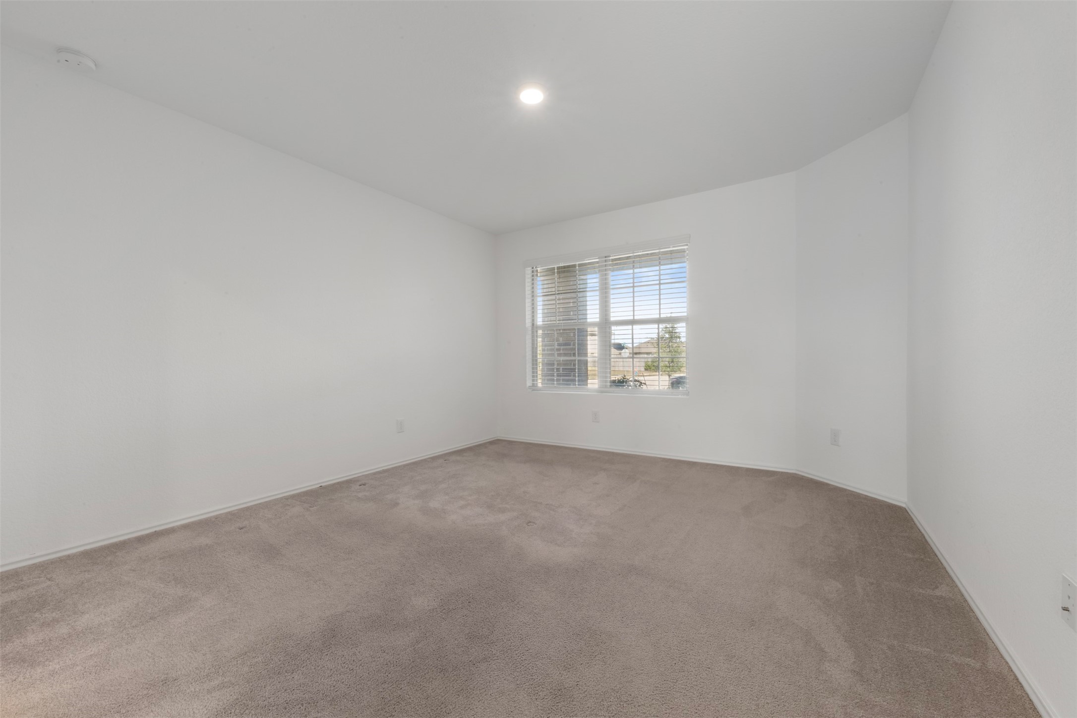 14538 Broadbury Pond Road Rosharon, TX 77583 - Photo 17 of 25 an empty room with windows