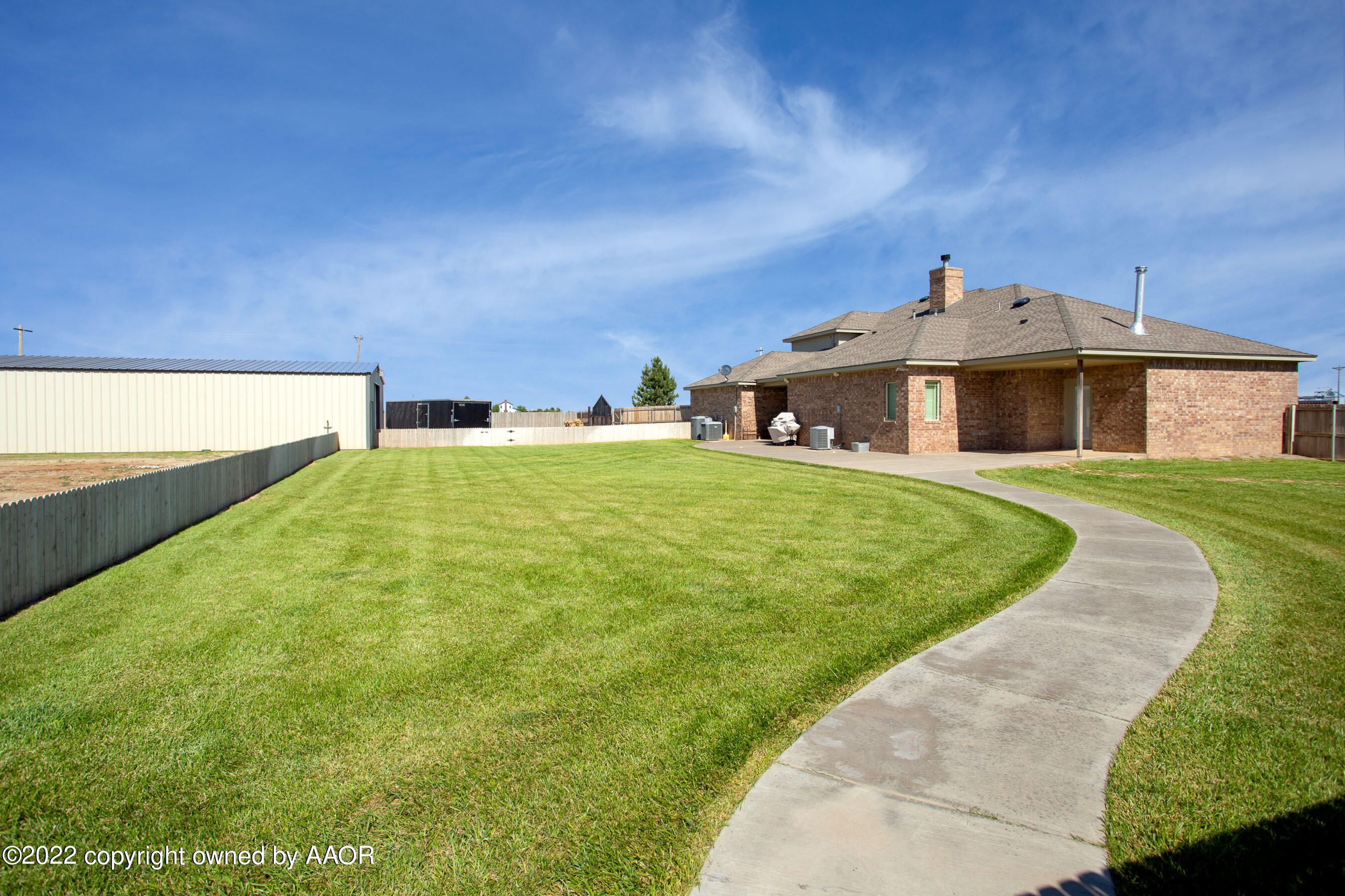 19151 Stone Creek Road Amarillo, TX 79124 - Photo 42 of 64 Sidewalk to pool house