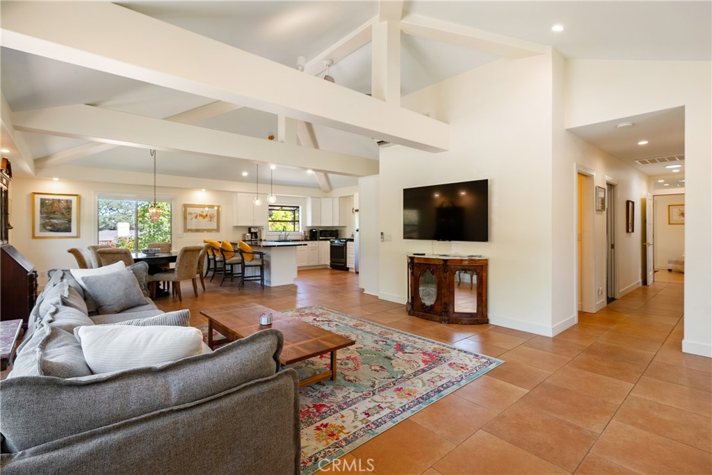 204 18th Street Paso Robles, CA 93446 - Photo 15 of 65 a living room with furniture and a flat screen tv