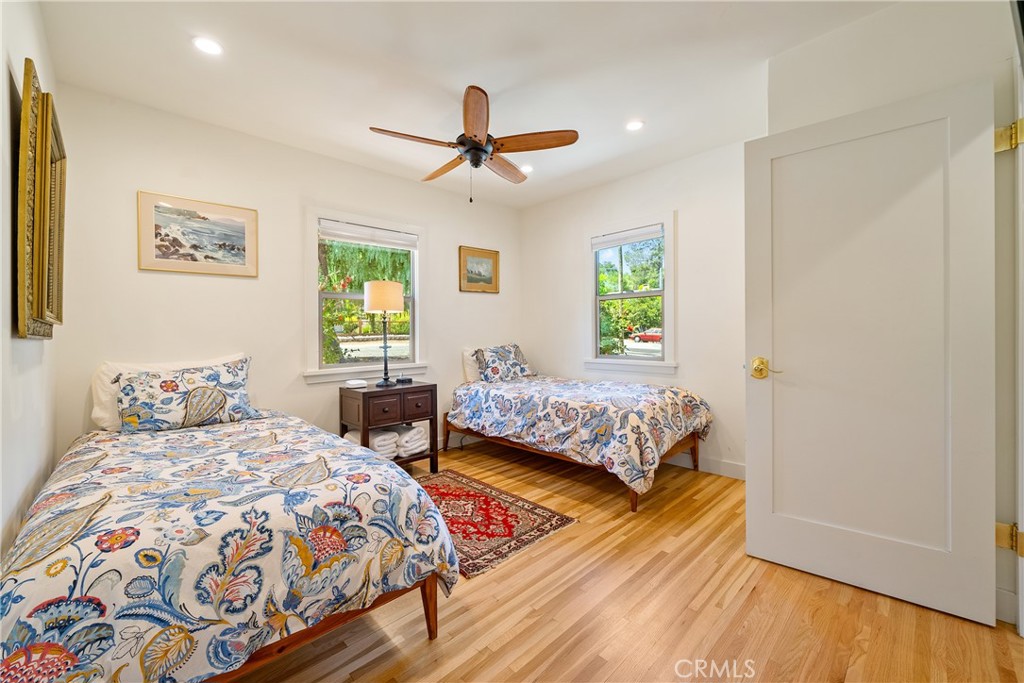 204 18th Street Paso Robles, CA 93446 - Photo 28 of 65 a bedroom with double bed and a window
