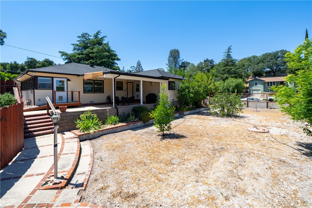 204 18th Street Paso Robles, CA 93446 - Photo 31 of 65 a front view of a house with garden