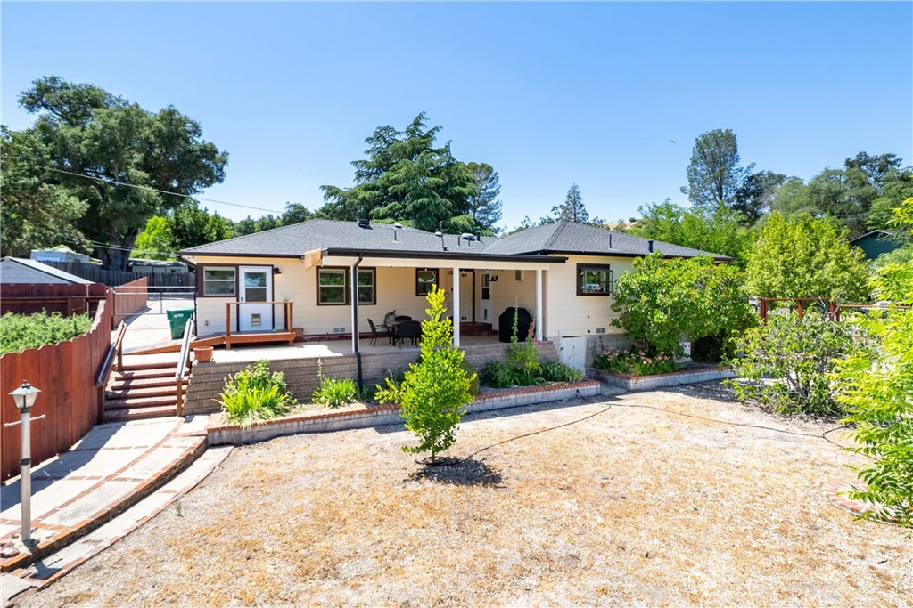 204 18th Street Paso Robles, CA 93446 - Photo 32 of 65 front view of a house with a yard