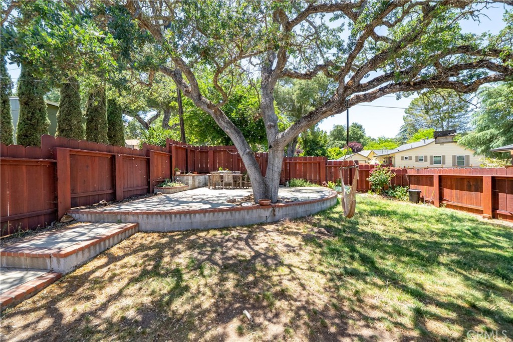 204 18th Street Paso Robles, CA 93446 - Photo 38 of 65 a view of a house with backyard and sitting area