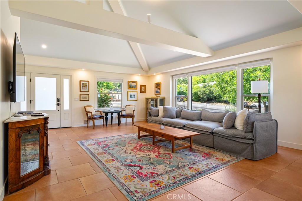 204 18th Street Paso Robles, CA 93446 - Photo 5 of 65 a living room with furniture and a large window