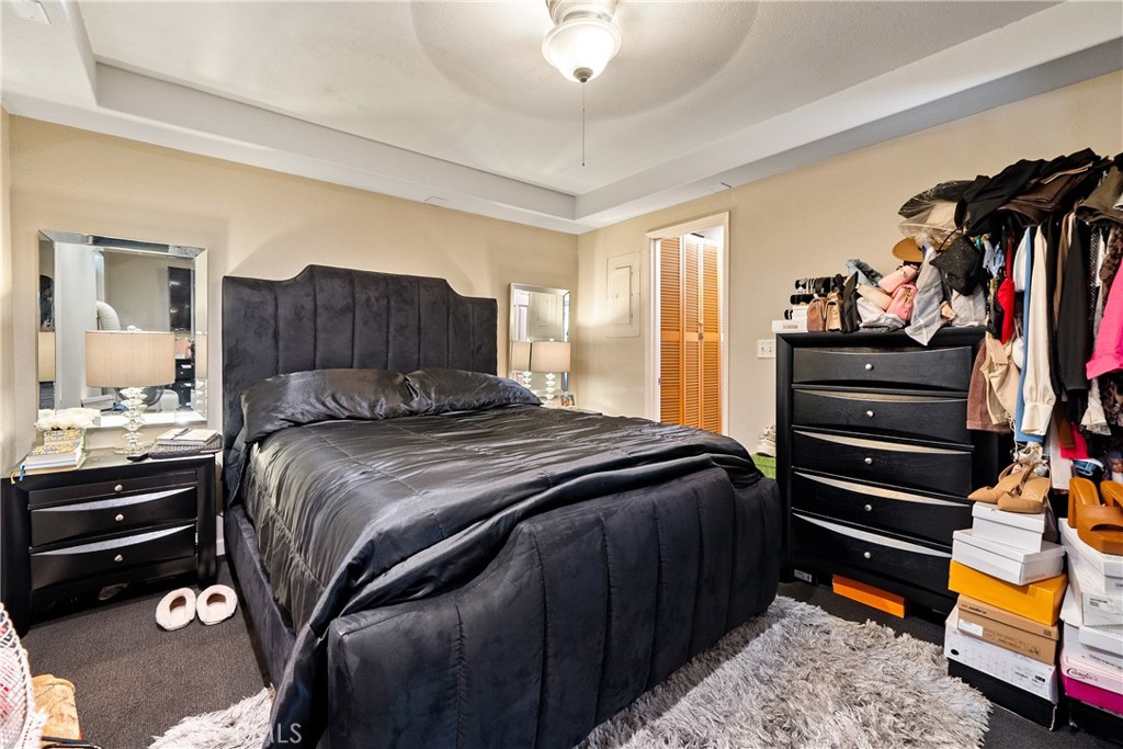 204 18th Street Paso Robles, CA 93446 - Photo 58 of 65 a bedroom with a bed and a closet