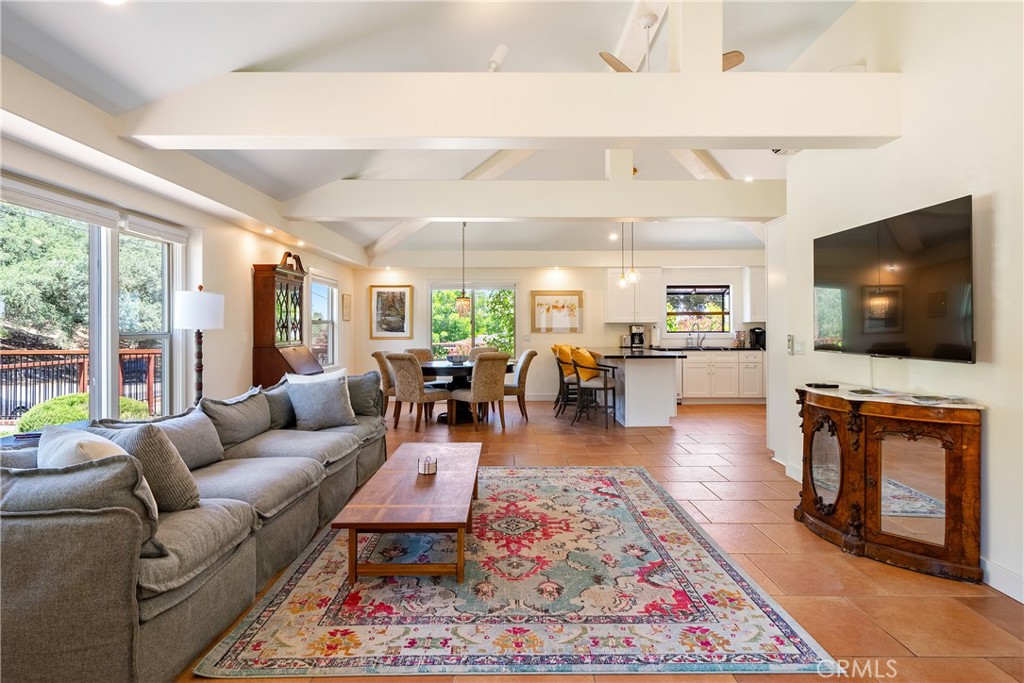 204 18th Street Paso Robles, CA 93446 - Photo 7 of 65 a living room with furniture wooden floor and a flat screen tv