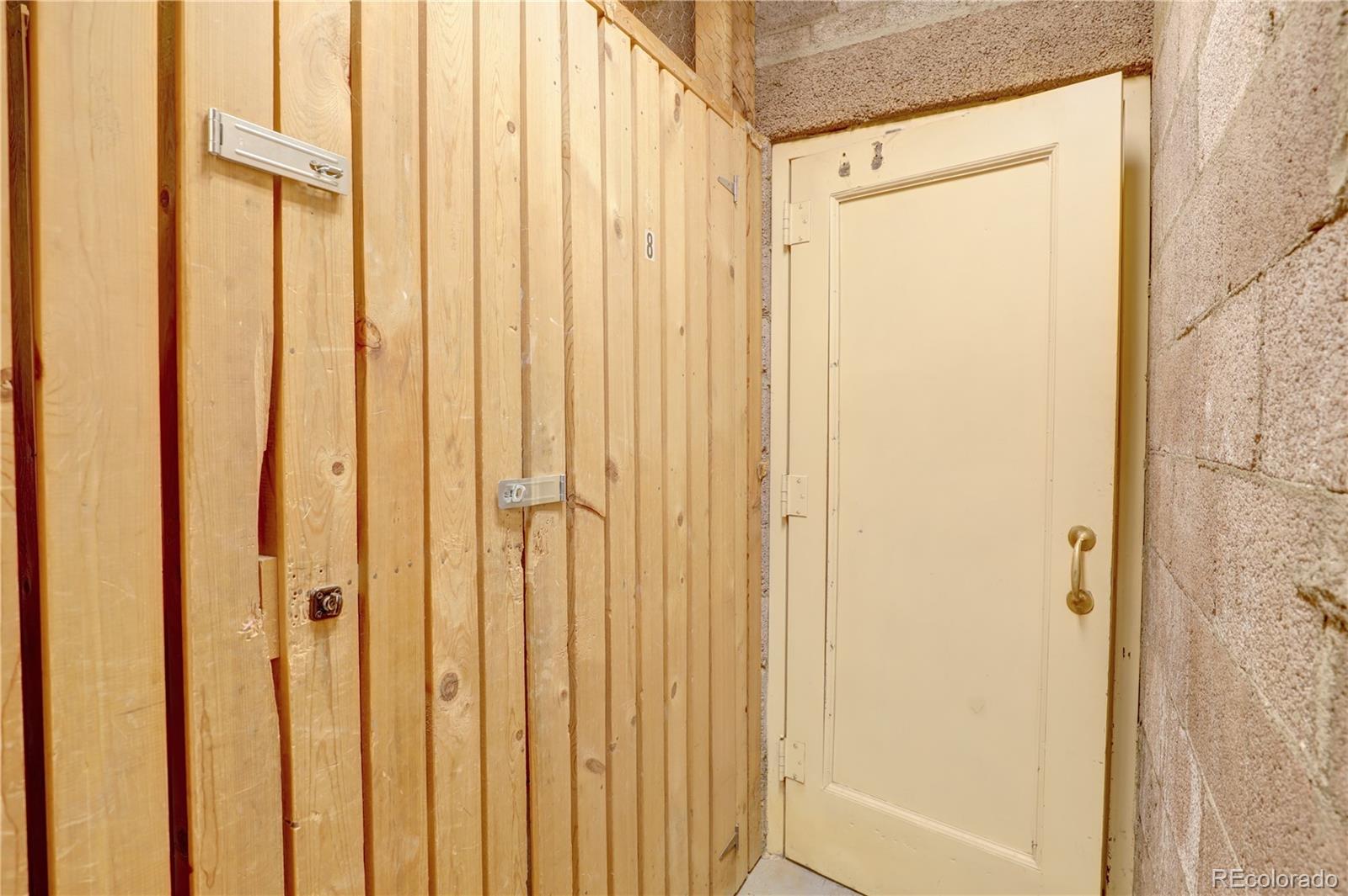 2100 Franklin Street, Unit 8 Denver, CO 80205 - Photo 20 of 29 a view of a bathroom with a shower and a door