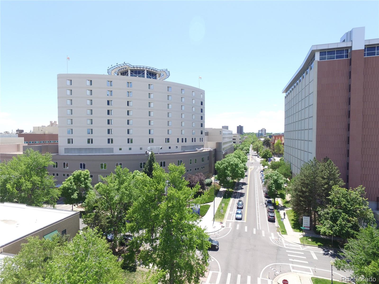 2100 Franklin Street, Unit 8 Denver, CO 80205 - Photo 23 of 29 a view of a building in the background