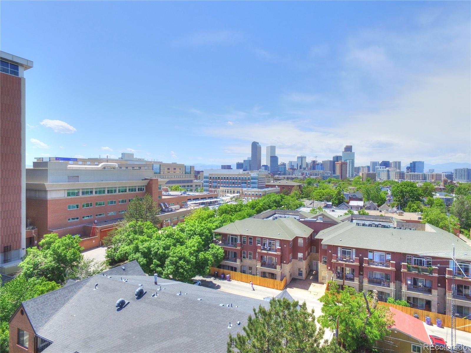 2100 Franklin Street, Unit 8 Denver, CO 80205 - Photo 24 of 29 a view of a city with tall buildings