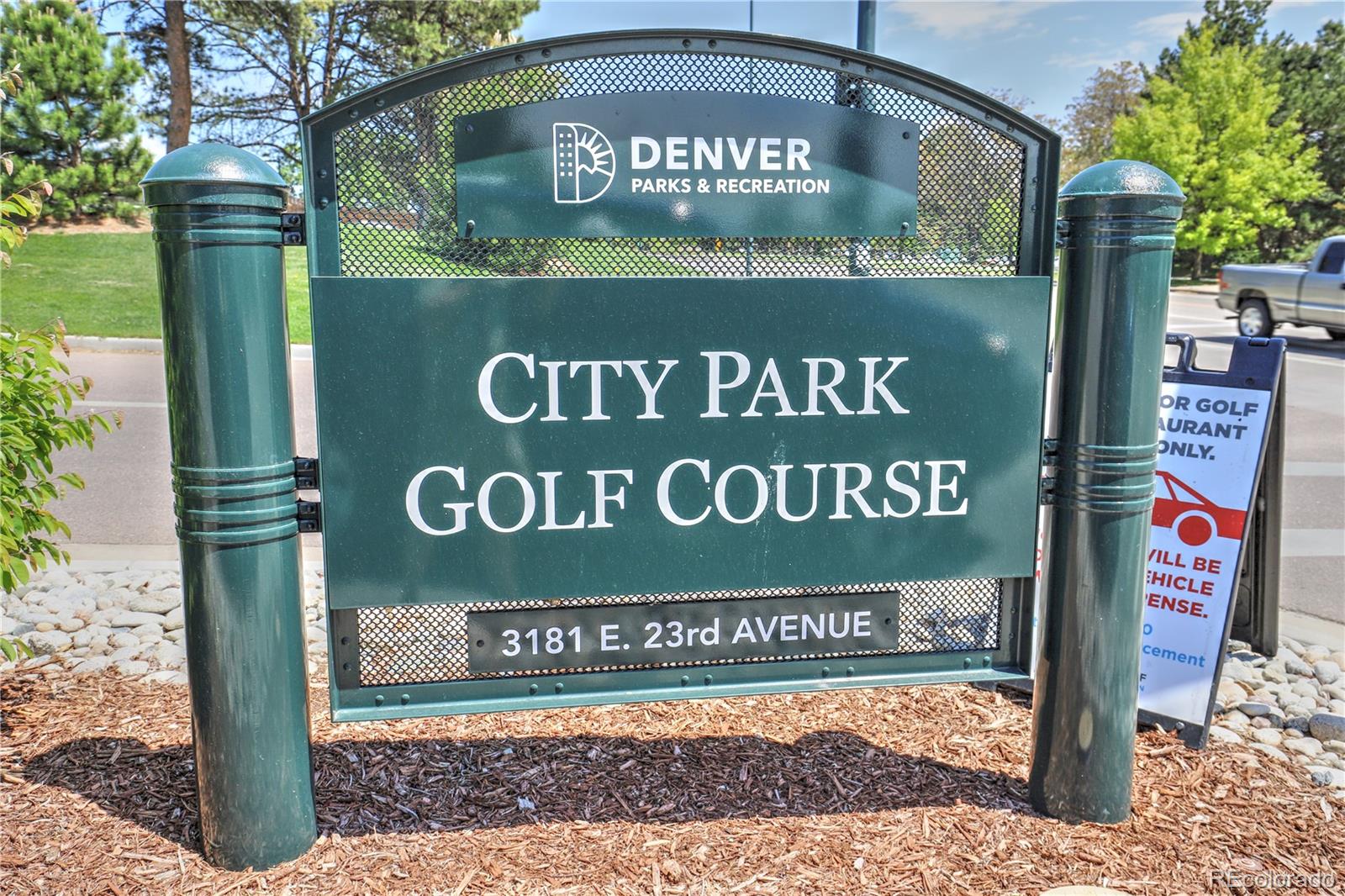 2100 Franklin Street, Unit 8 Denver, CO 80205 - Photo 26 of 29 a sign broad on wooden wall
