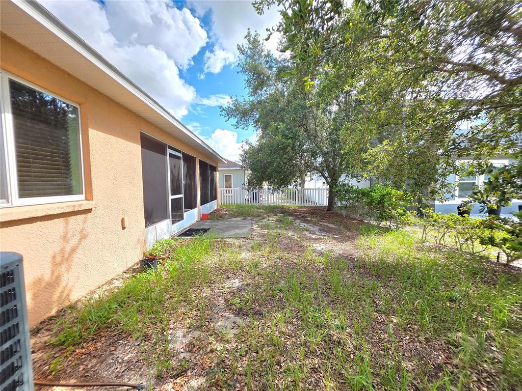 4284 High Ridge Avenue Spring Hill, FL 34609 - Photo 39 of 40 a view of backyard of house with green space