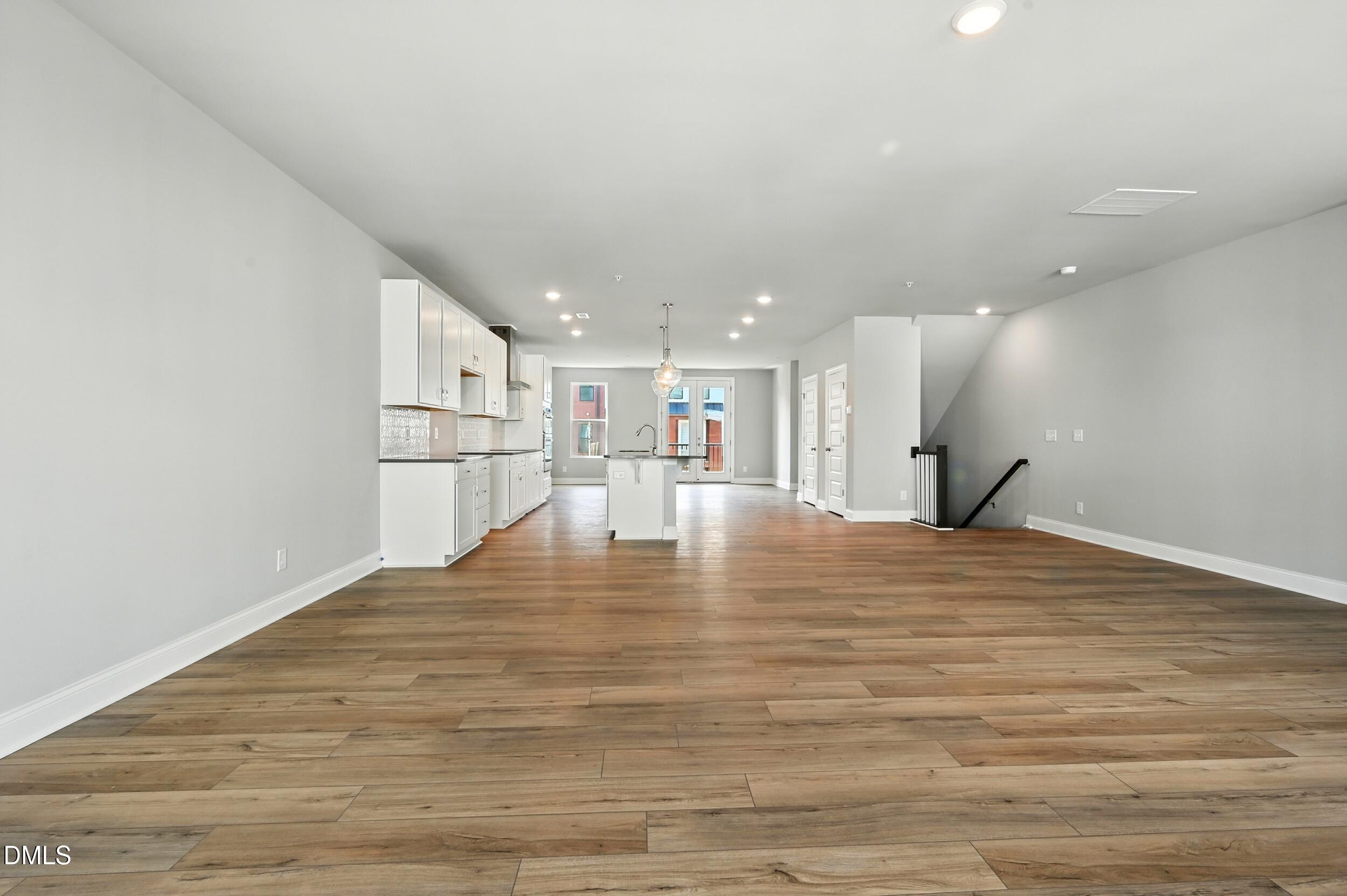 1232 South Person Street, Unit 201 Raleigh, NC 27601 - Photo 10 of 45 Living Room to Kitchen