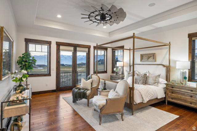 707 Chimney Rock Road, Unit 247 Heber City, UT 84032 - Photo 13 of 64 Bedroom featuring dark wood-style floors, ceiling fan, access to exterior, a tray ceiling, and recessed lighting