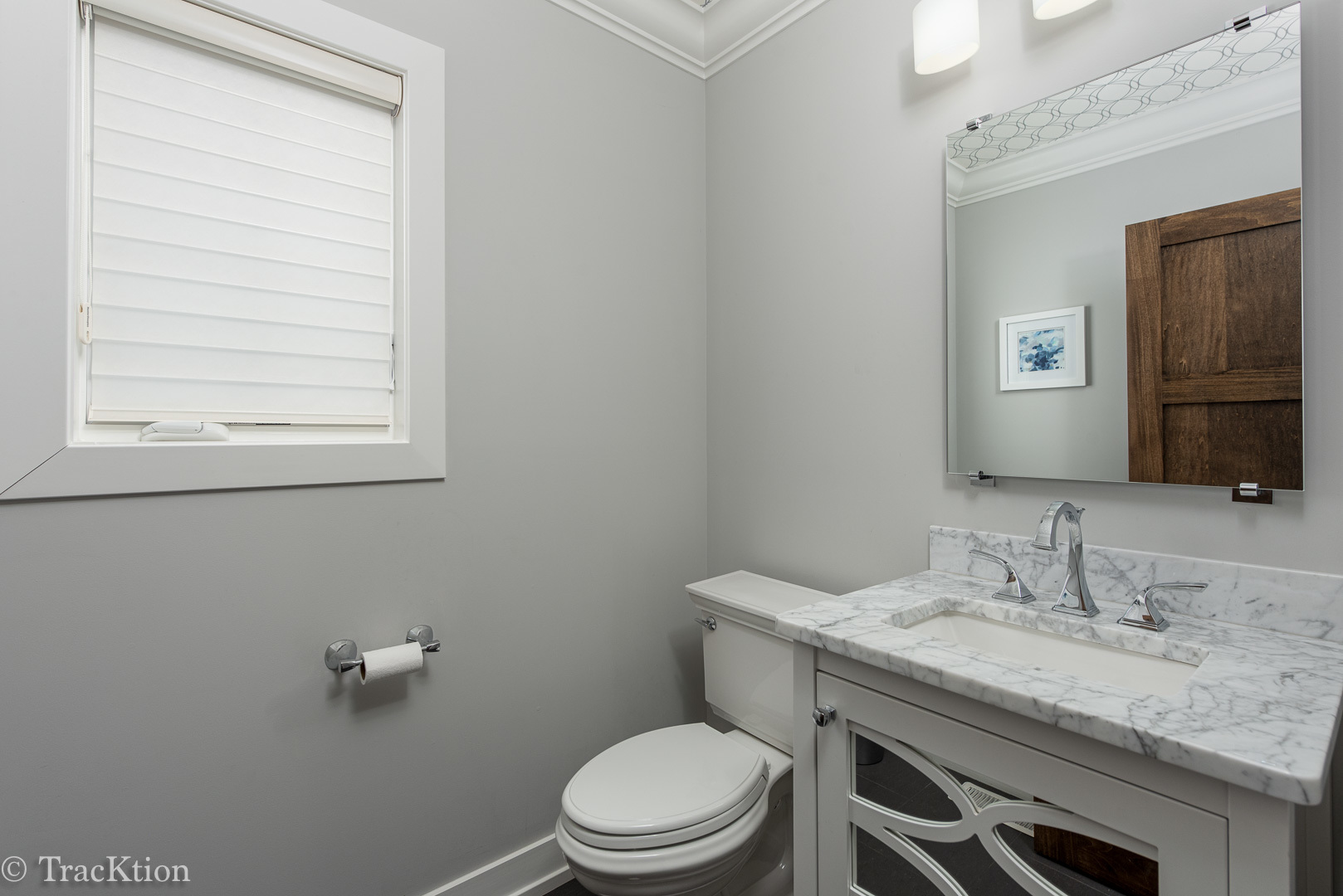 532 North Rose Avenue Park Ridge, IL 60068 - Photo 18 of 48 a bathroom with a granite countertop toilet a sink and a mirror