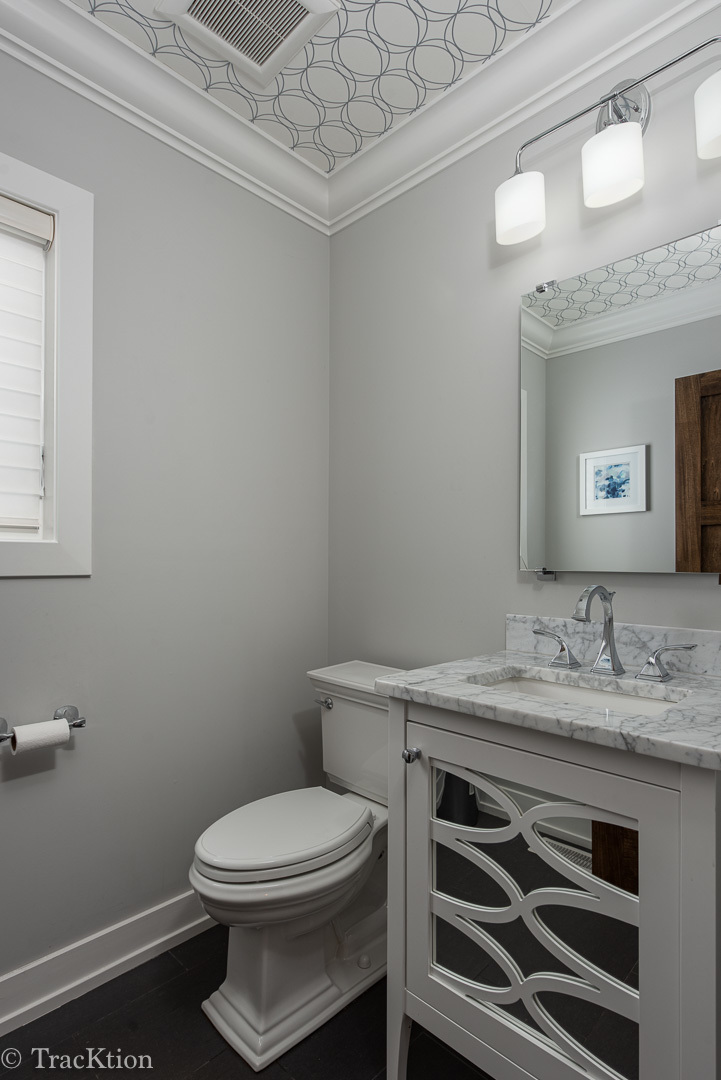 532 North Rose Avenue Park Ridge, IL 60068 - Photo 19 of 48 a bathroom with a toilet sink and mirror