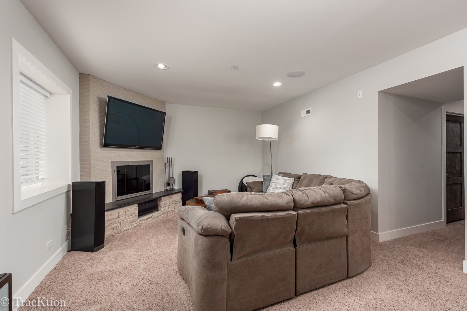 532 North Rose Avenue Park Ridge, IL 60068 - Photo 35 of 48 a living room with furniture a flat screen tv and a fireplace