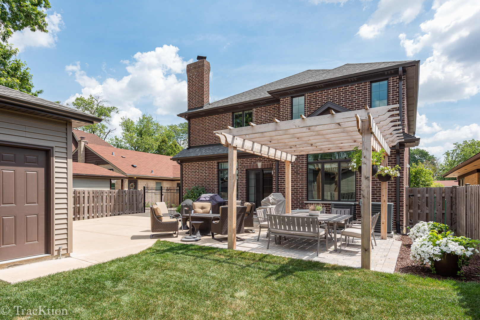 532 North Rose Avenue Park Ridge, IL 60068 - Photo 46 of 48 a patio with table and chairs and potted plants with sky view