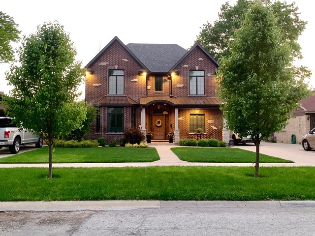 532 North Rose Avenue Park Ridge, IL 60068 - Photo 48 of 48 a front view of a house with a yard