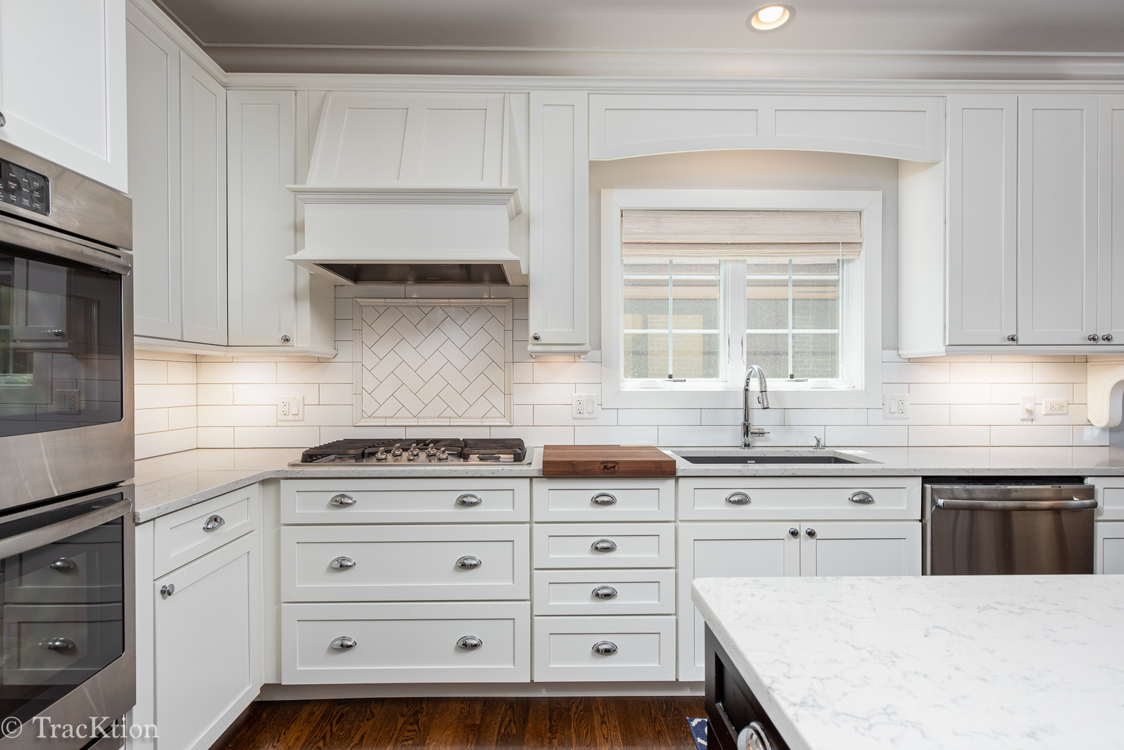 532 North Rose Avenue Park Ridge, IL 60068 - Photo 7 of 48 a kitchen with cabinets appliances a sink and a window
