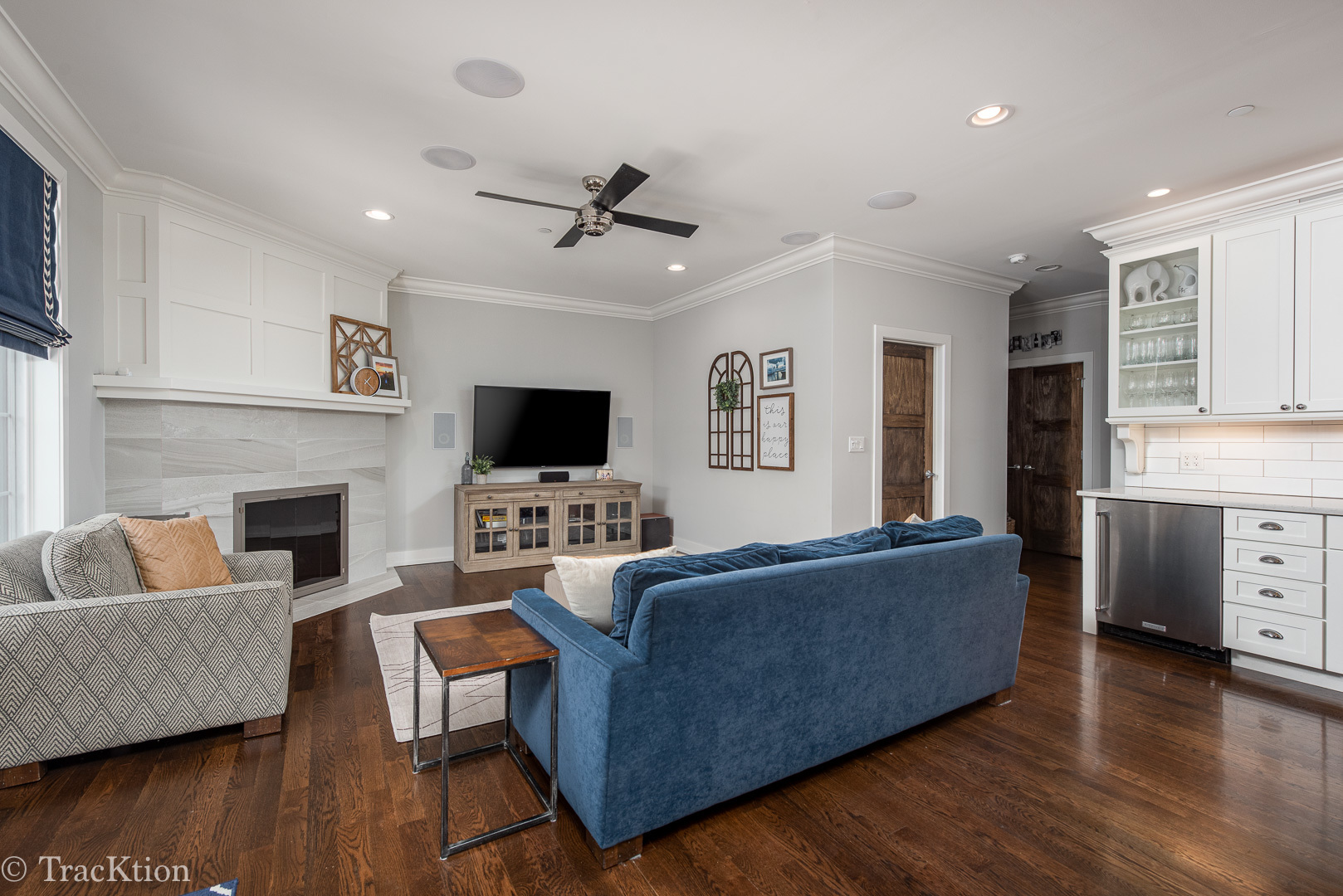 532 North Rose Avenue Park Ridge, IL 60068 - Photo 9 of 48 a living room with furniture a flat screen tv and a fireplace
