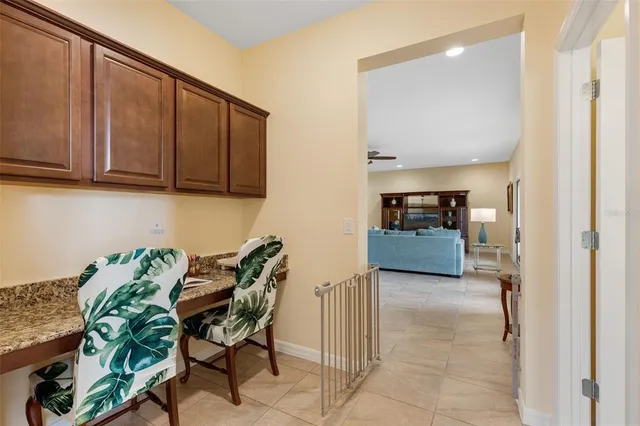 a view of livingroom with furniture and cabinet
