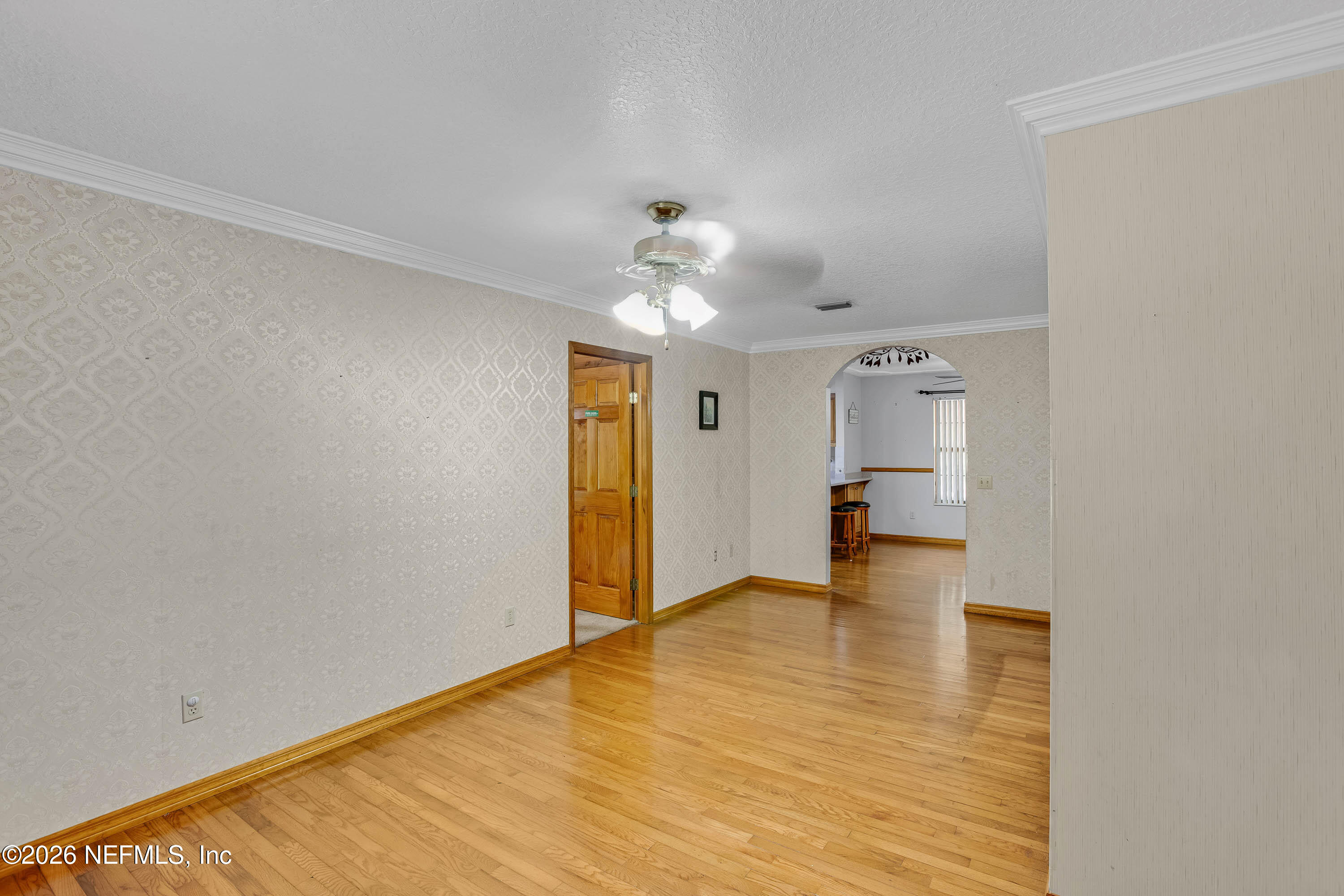 289 Chesser Road Interlachen, FL 32148 - Photo 16 of 63 a view of empty room with wooden floor