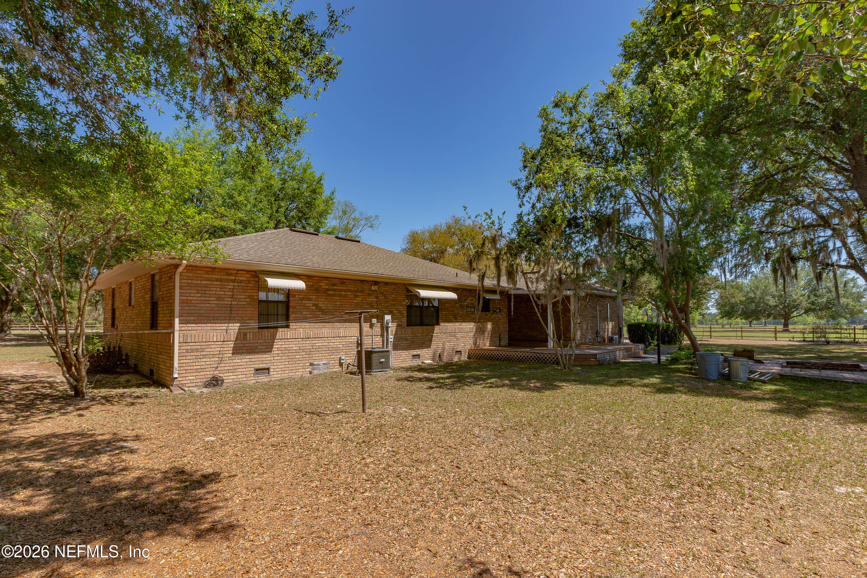 289 Chesser Road Interlachen, FL 32148 - Photo 39 of 63 a front view of a house with a yard